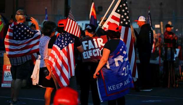 Supporters of US President Donald Trump gather for a u2018Stop the Stealu2019 protest after the 2020 US presidential election was called for Democratic candidate Joe Biden, at the Maricopa County Tabulation and Election Center (MCTEC), in Phoenix, Arizona