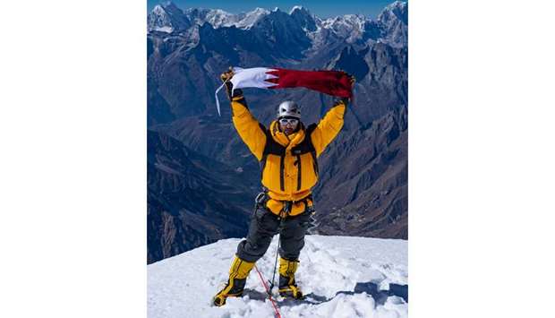 Qatari mountaineer and philanthropist Moe al-Thani on the summit of Ama Dablam.