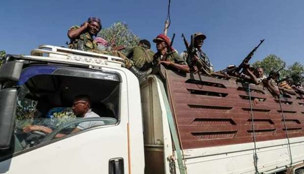 Members of Amhara region militias travel to face the Tigray People's Liberation Front in Sanja.