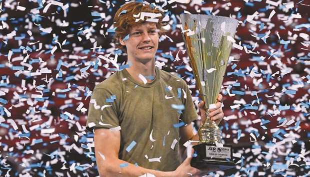 Italian player Jannik Sinner celebrates with the trophy after winning the ATP 250 Sofia Open tournament in Sofia yesterday. (AFP)