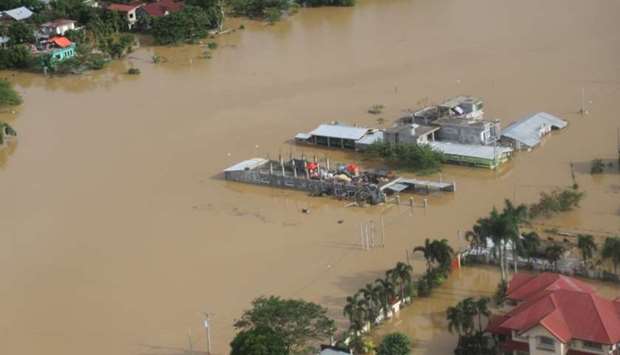 Buildings are flooded in the aftermath of Typhoon Vamco, in the Cagayan Valley region in the Philippines