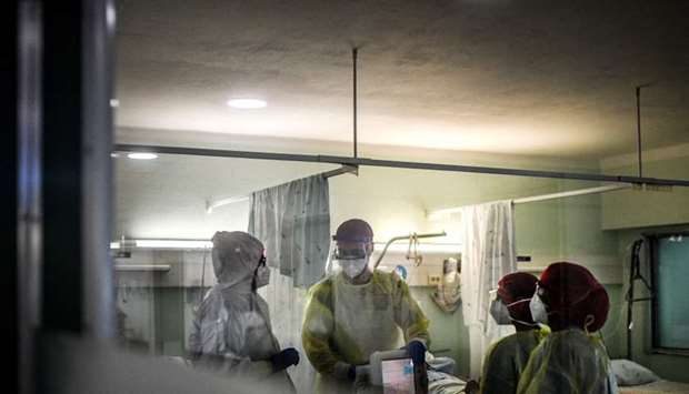 Medical staff work at the Covid-19 ward of the Curry Cabral hospital in Lisbon. Pfizer and BioNTech said that a completed study of their experimental Covid-19 vaccine showed it was 95 percent effective