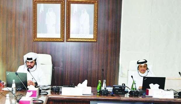 QDB CEO Abdulaziz bin Nasser al-Khalifa and Qatar Chamber chairman Sheikh Khalifa bin Jassim al-Thani during the webinar. Right: Qatar Chamber board members and QDB officials during the webinar.