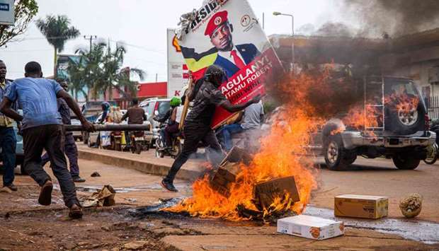 Ugandan police fired tear gas and rubber bullets at large crowds of protesters supporting popular presidential candidate Bobi Wine, who was earlier arrested while campaigning.