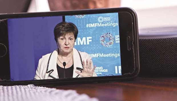 IMF managing director Kristalina Georgieva speaks during a virtual news conference seen on a smartphone in Arlington, Virginia. u201cCountries have started to climb back from the depths of the Covid-19 crisis. But the resurgence in infections in many economies shows just how difficult and uncertain this ascent will be,u201d Georgieva said in a blog post.