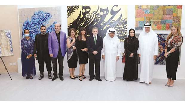 Artists and organisers with Sheikh Faisal bin Qassim al-Thani at the exhibition