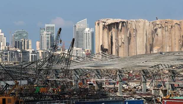 A view shows damage at the site of a massive explosion in Beirut's port area, as part of the city's skyline in seen in the background, in Beirut, Lebanon August 12, 2020