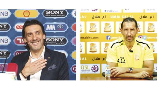 Al Ahli coach Nebosha Jovovic (L) and his Umm Salal counterpart Aziz Ben Askar.