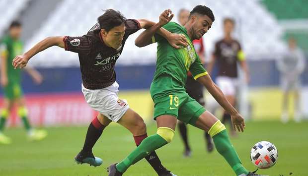 Beijing Guoanu2019s A Lan (right) in action during the AFC Champions League Group E match against FC Seoul at Education City Stadium yesterday. PICTURE: Noushad Thekkayil