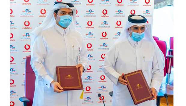 Vodafone Qataru2019s CEO Sheikh Hamad bin Abdulla al-Thani and Kahramaa president Essa bin Hilal al-Kuwari at the agreement signing ceremony Monday