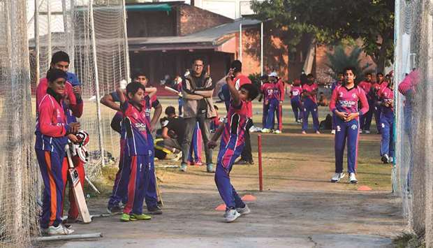 VOTE OF CONFIDENCE: Pakistani youth play cricket at a playground in Lahore. The return of Englandu2019s cricket team to Pakistan next year, their first visit since 2005, is a vote of confidence in the countryu2019s improved security. (AFP)
