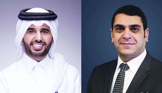 QDB CEO Abdulaziz bin Nasser al-Khalifa (L), USQBC managing director Mohamed Barakat