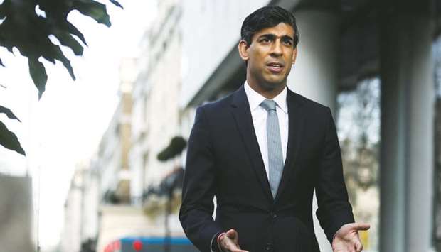 Britainu2019s Chancellor of the Exchequer Rishi Sunak talks during a TV interview in London yesterday. The chancellor will unveil departmental budgets on Wednesday as he seeks to balance the need to support the economy against the long-term risks of ballooning government borrowing.