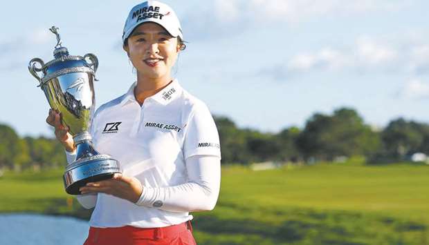 Kim Sei-young of Korea poses with the trophy after winning the Pelican Womenu2019s Championship at Pelican Golf Club in Belleair, Florida. (AFP)