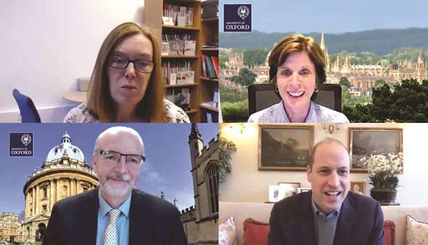 A still image taken from footage of a video call released by Kensington Palace on Monday shows Britain's Prince William (bottom R) speaking to Oxford University researchers Sarah Gilbert, Professor of Vaccinology (top L), Andy Pollard, Professor of Paediatric Infection and Immunity and director of the Oxford Vaccine Group (bottom L) and Professor Louise Richardson, Vice Chancellor of Oxford University (top R) to congratulate them following the announcement of positive trial data for their Covid-19 vaccine developed in collaboration with AstraZeneca.