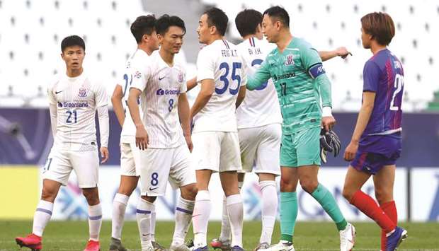 Shanghai Shenhuau2019s players celebrate their win over FC Tokyo yesterday. (Reuters)