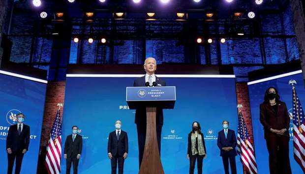 President-elect Joe Biden stands with his nominees for his national security team at his transition headquarters in the Queen Theater in Wilmington, Delaware, US