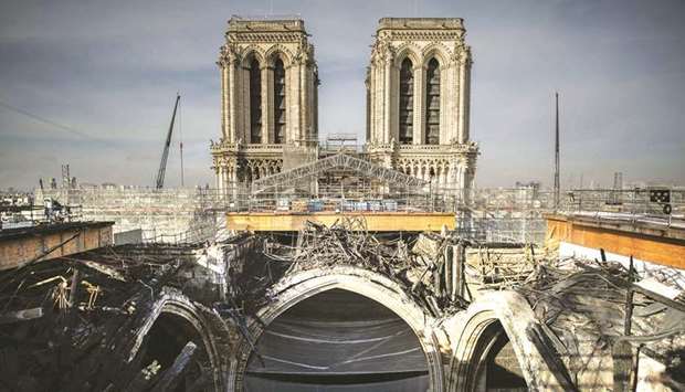 A photograph taken yesterday shows the melted scaffolding on the roof of Parisu2019s Notre-Dame cathedral during reconstruction works. Reconstruction of cathedral reached a turning point yesterday with the removal of the last portions of scaffolding that melted during last yearu2019s blaze, which will allow crucial protective and stabilisation work to proceed.