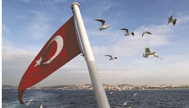 A Turkish flag flies on a passenger ferry with the Bosphorus in the background in Istanbul (file).