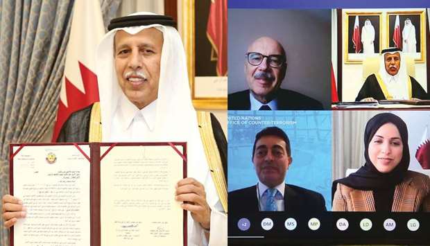 HE Speaker of the Shura Council Ahmed bin Abdullah bin Zaid al-Mahmoud shows off the agreement after signing it. Qatar and UN officials at the agreement signing programme on Wednesday.
