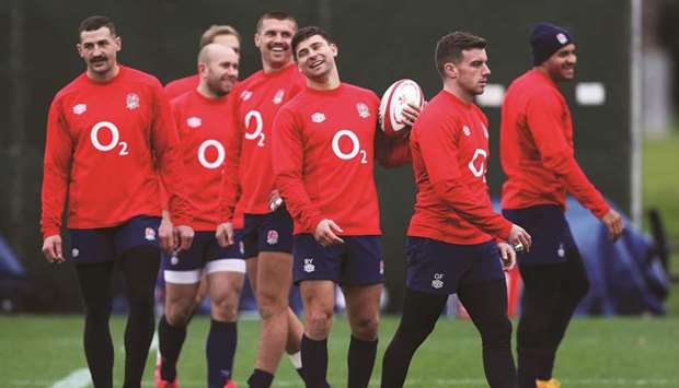 Englandu2019s George Ford with teammate Jonny May during their training session in Teddington, Britain. (Reuters)