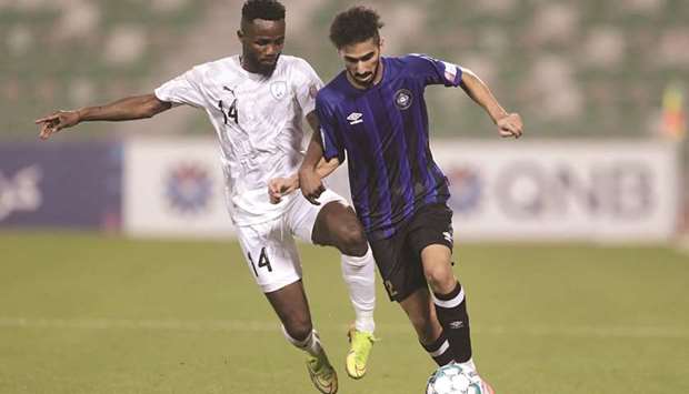 Al Wakrahu2019s Omar Ali (left) in action during the QNB Stars League match against Al Sailiya at Abdullah Bin Khalifa Stadium yesterday. (Twitter/QSL)