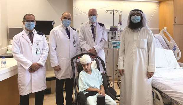 Dr Khalid al-Kharazi, Dr Husam Kayyali, Dr Ian Pople with Salem and his father, Dr Abdulrahman Abdullah