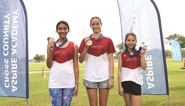 Doha Athletics Club athletes sweeped the honours for the girls cadet race with Anna Sanchez (centre) winning the run ahead of second-placed Lily Schnurman (right) and third-placed Zoha Siddiqui (left) at Aspire Cross Country in Aspire Park on Friday.