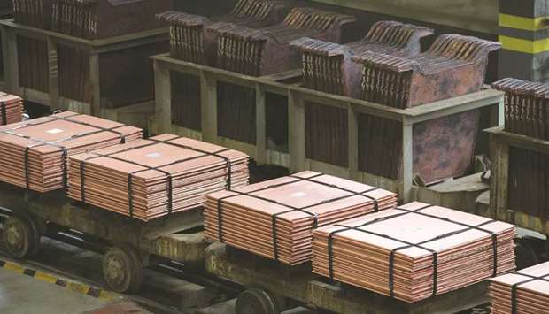 Newly-made copper cathode sheets stand stacked on wagons before they are moved from the electrolysis shop at the Uralelectromed Copper Refinery, operated by Ural Mining and Metallurgical Co in Russia. The copper market is experiencing a wave of investor interest the likes of which it hasnu2019t seen for a decade. A flood of investor dollars lifted the bellwether industrial metal to a seven-year high of $7,520 a tonne last week.