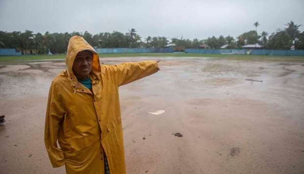 A man points on damages at the Bilwi's Baseball Stadium, as Hurricane Eta makes landfall in Bilwi, Puerto Cabezas, Nicaragua