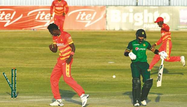 Zimbabweu2019s Blessing Muzarabani (L) celebrates after taking the wicket of Pakistanu2019s Imam-ul-Haq (2R) during the third one-day international (ODI) in Rawalpindi yesterday.