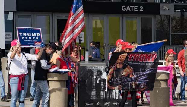 Supporters of President Donald Trump protest outside State Farm Arena as ballots continue to be counted inside in Atlanta, Georgia