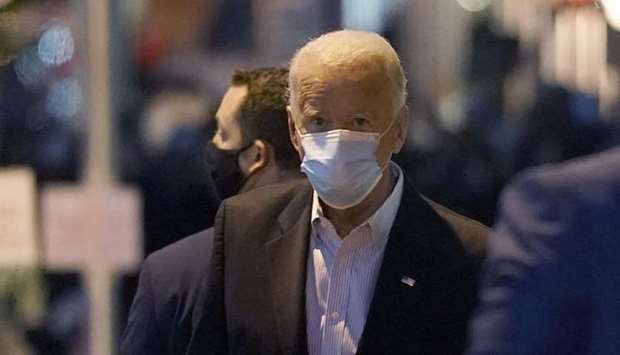 Democratic presidential nominee Joe Biden walks out of The Queen theater in Wilmington, Delaware. AFP