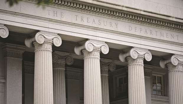 The US Treasury building in Washington, DC. Treasuries are on pace for their strongest year since 2011. However, if strategists at primary dealers BMO Capital Markets and Citigroup are right, some of the gains may fade.