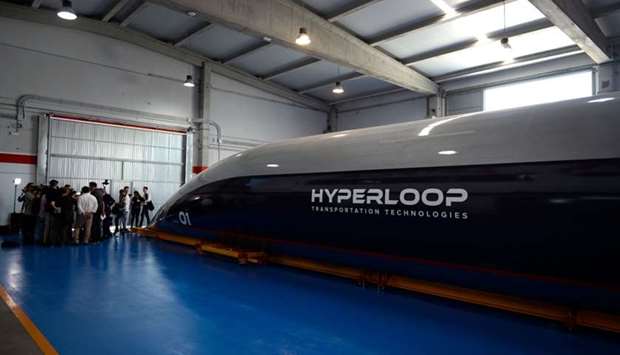 In this file photo taken on October 2, 2018 a full-scale passenger Hyperloop capsule is presented by Hyperloop Transportation Technologies in El Puerto de Santa Maria
