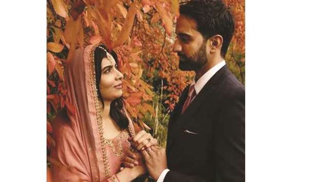 Malala with husband Asser. (Instagram photo)