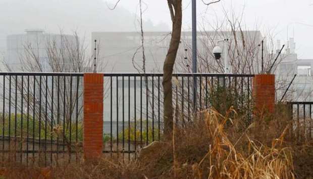 The P4 laboratory of Wuhan Institute of Virology is seen behind a fence during the visit by the World Health Organization (WHO) team tasked with investigating the origins of the coronavirus disease.