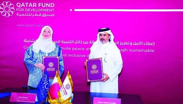 The agreement was signed by Deputy Director General of projects at QFFD Misfer al-Shahwani and Chief of the IOM in Qatar Iman Ereiqat.
