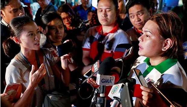 Rappler reporter Pia Ranada interviews Davao City Mayor Sara Duterte, the eldest daughter of President Rodrigo Duterte, after a campaign sortie in Calamba City, Laguna, Philippines, March 9, 2019. REUTERS