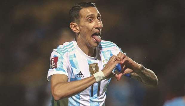 Argentinau2019s Angel Di Maria celebrates after scoring against Uruguay during the South American qualifiers for the FIFA World Cup Qatar 2022 at the Campeon del Siglo Stadium in Montevideo. (AFP)