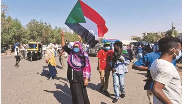 Sudanese anti-coup protesters take part in a demonstration in the capital Khartoum yesterday.