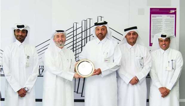 IPRA national co-ordinator in Qatar Jassem Ibrahim Fakhroo handed over the golden award to Ashghal's Public Relations and Communications manager Abdulla Saad al-Saad.