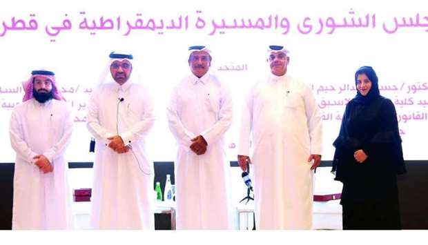 HE the Minister of Justice Masoud bin Mohamed al-Ameri with officials at the conference.