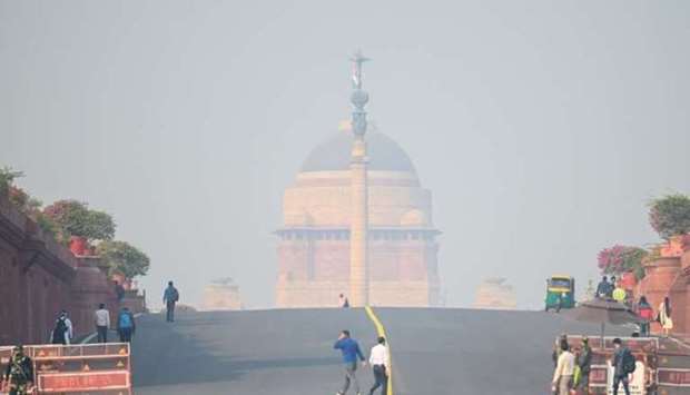 Delhi shut down schools until further notice, urged people to work from home and banned non-essential trucks from entering the Indian capital due to dangerous levels of air pollution.