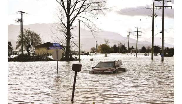 The South Parallel road is submerged in flood water after rainstorms caused flooding and landslides in Abbotsford, British Columbia, Canada.