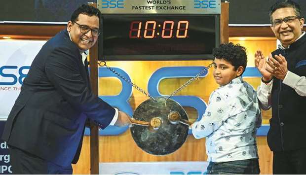Paytm founder Vijay Shekhar Sharma (left) rings a ceremonial gong during his companyu2019s IPO listing ceremony at the stock exchange in Mumbai yesterday. Paytm lost more than a quarter of its value on its market debut after raising $2.5bn in the countryu2019s biggest-ever IPO, as traders questioned whether the loss-making firm would ever turn a profit.