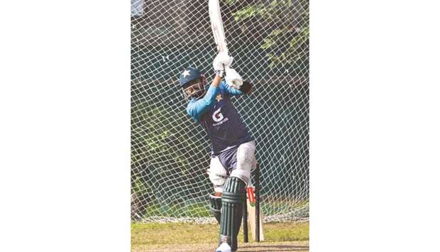 Pakistanu2019s captain Babar Azam plays a shot during a training session yesterday, ahead of the first T20I against Bangladesh at the Sher-e-Bangla National Cricket Stadium in Dhaka. (AFP)