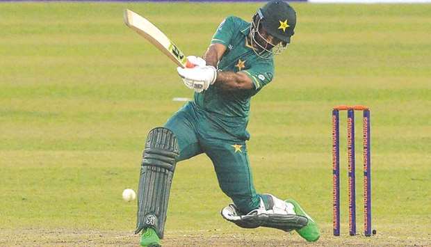 Pakistanu2019s Fakhar Zaman plays a shot during the first Twenty20I against Bangladesh at the Sher-e-Bangla National Cricket Stadium in Dhaka yesterday. (AFP)