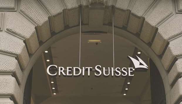 A sign above the entrance to the Credit Suisse Group headquarters in Zurich. Credit Suisse completed Europeu2019s first commercial real estate collateralised loan obligation, according to lawyers involved in the deal, breaking into a market thatu2019s more than doubled in the US.