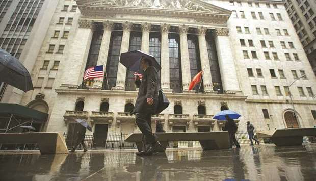 Pedestrians walking past the New York Stock Exchange. Some investors believe the stars are aligning for small-cap stocks, as the category stands to benefit from cheap valuations, robust economic growth and a relatively benign impact from looming tax policy changes.